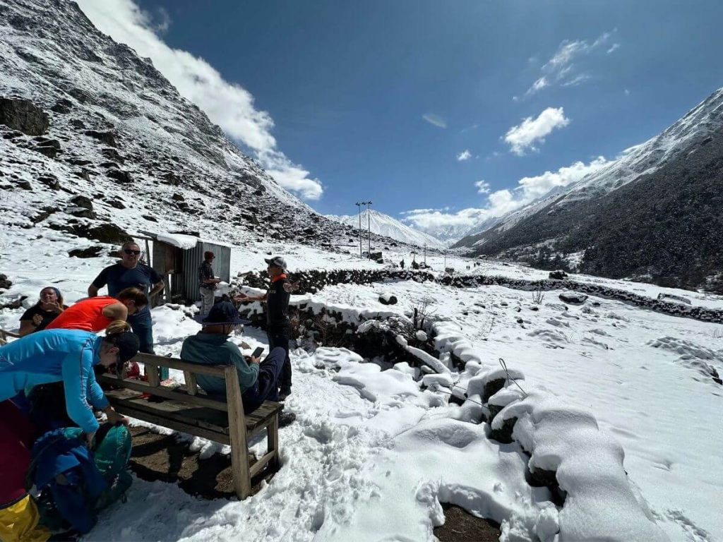 Snow-covered trekking route on the Langtang Gosaikunda trek in Nepal with Himalayan mountain views