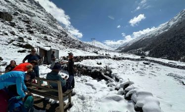 Snow-covered trekking route on the Langtang Gosaikunda trek in Nepal with Himalayan mountain views