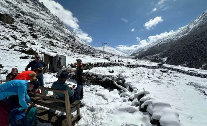 Snow-covered trekking route on the Langtang Gosaikunda trek in Nepal with Himalayan mountain views